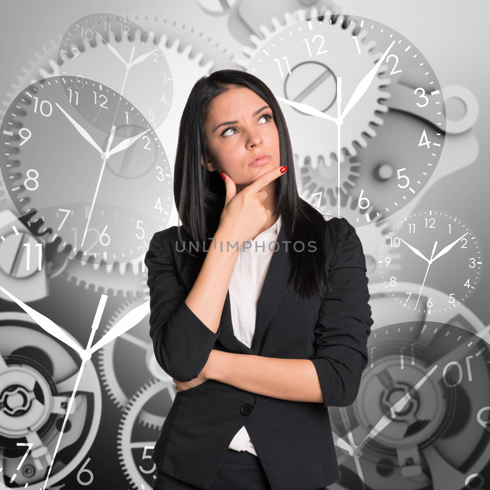 Thinking businesswoman on abstract background with clocks