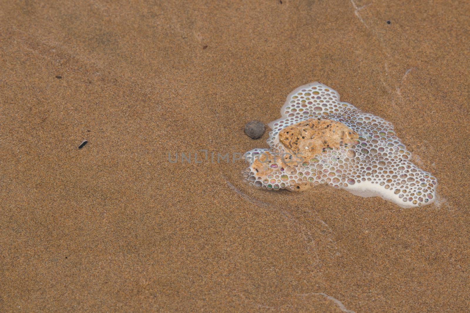 Stone on a sandy beach by YassminPhoto