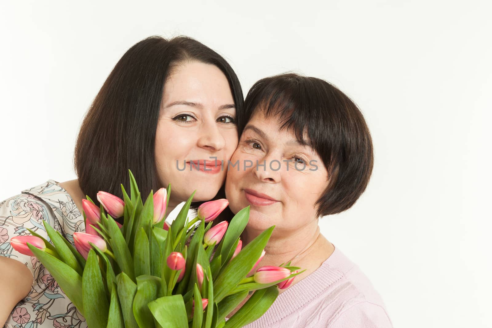 the woman presented a bouquet of flowers for mother