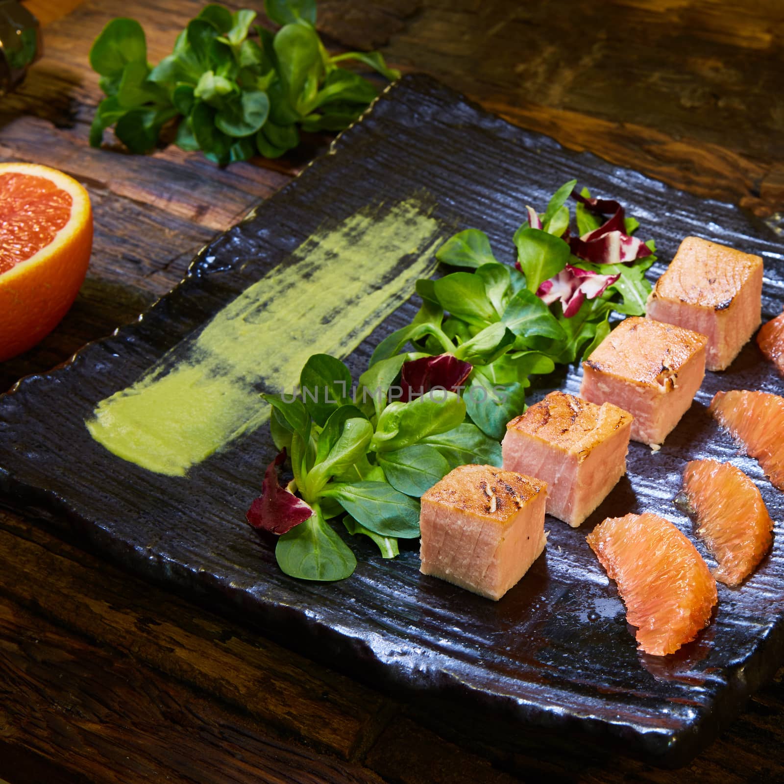 Grill salmon salad, with mixed greens, avocado,grapefruit. Delicious healthy eating. by sarymsakov