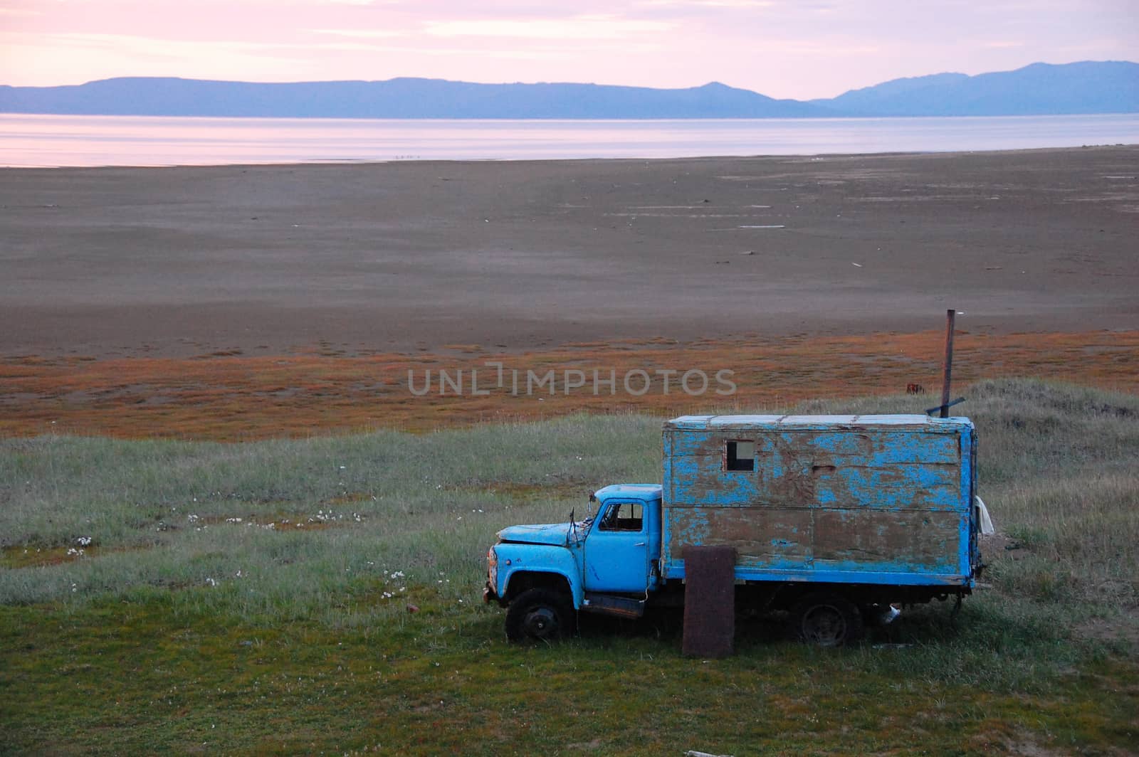 Old broken truck dapted as shed at tundra island, Routan Island, Chikotka, Russia