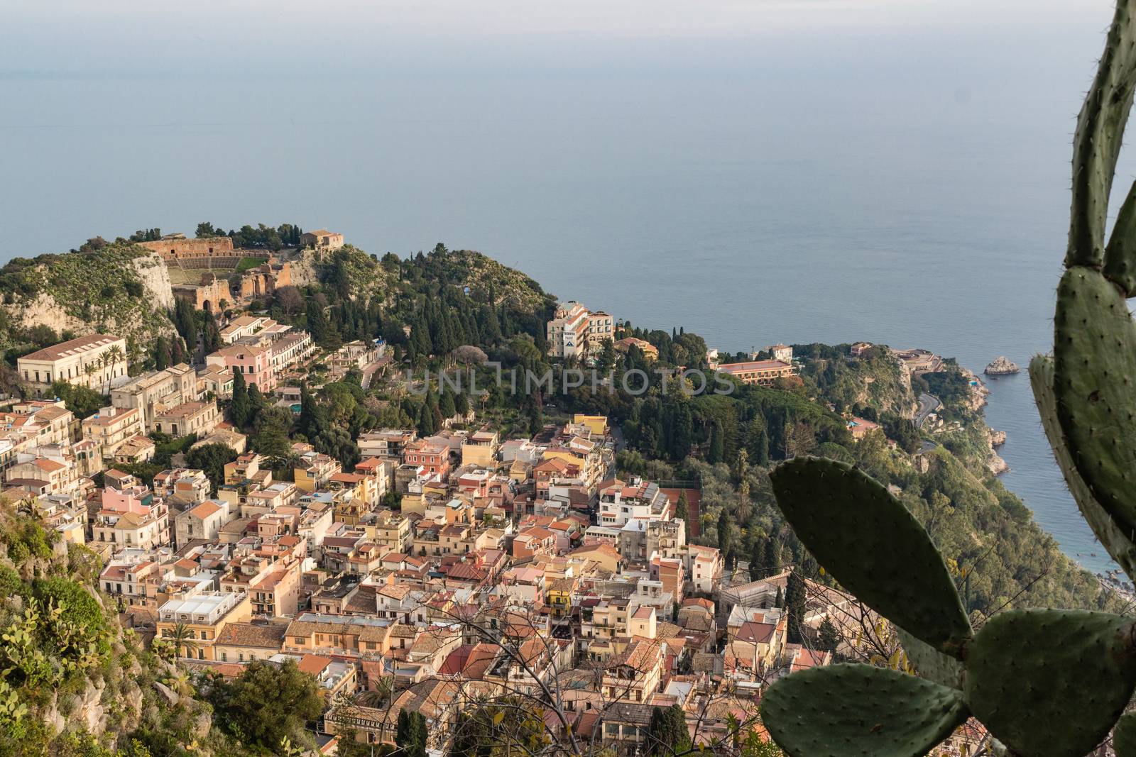 Aerial view of the Taormina city, with the ancient greek amphitheatre, Sicily island, Italy.