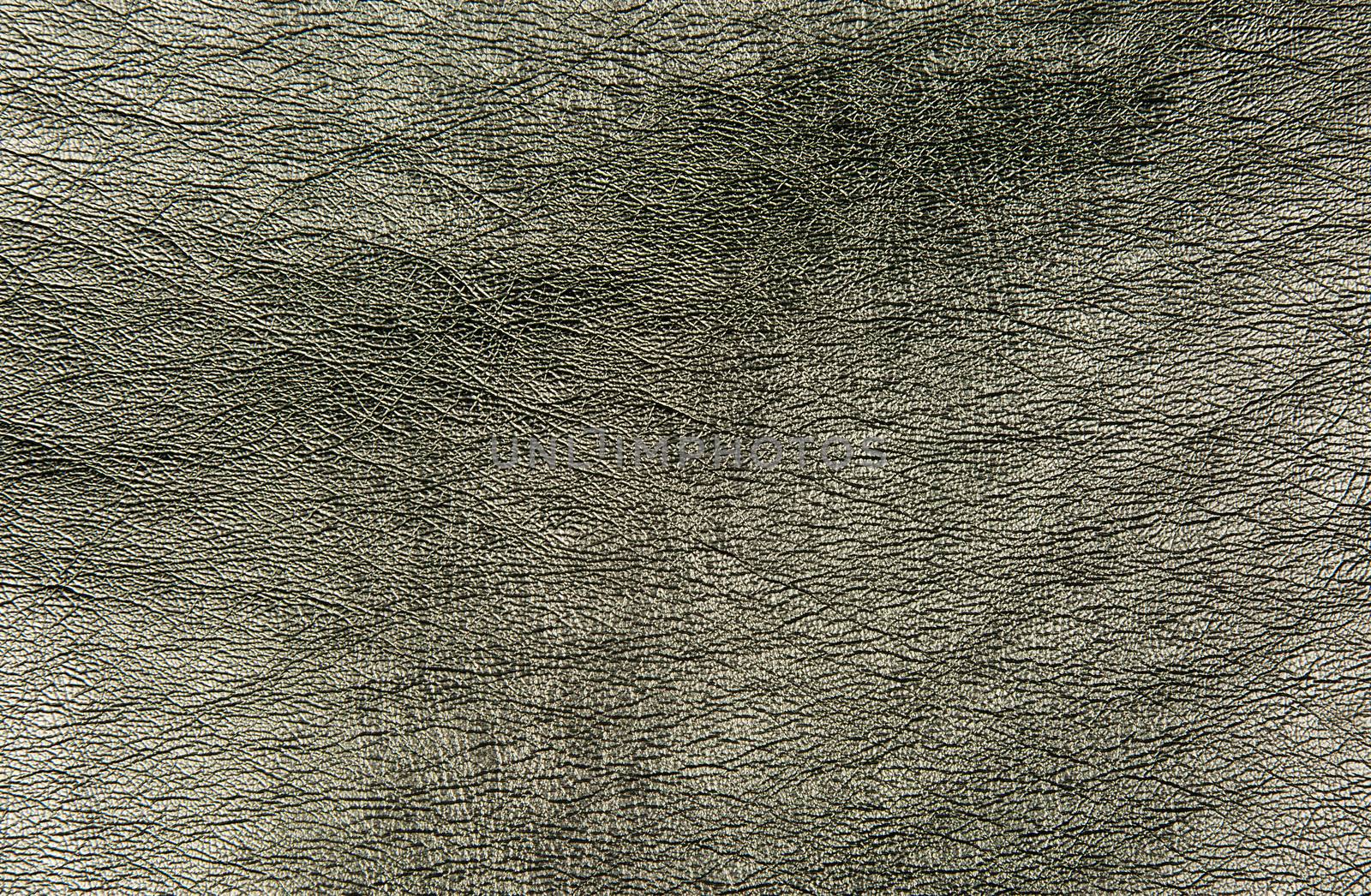 Texture of coarse ground leather with clearly visible structure. Interesting background and texture. horizontal view.
