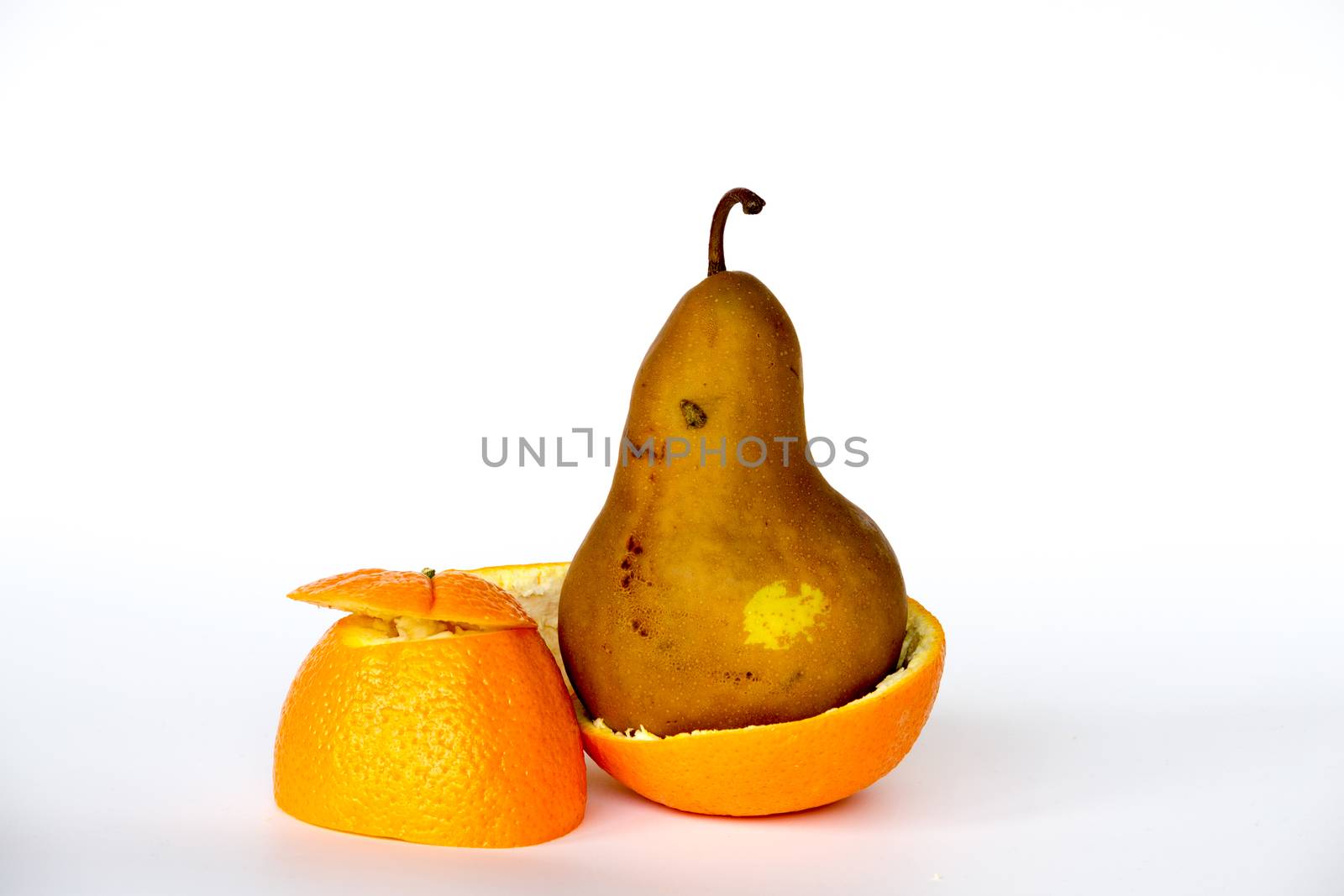 Pear inside an orange by rmbarricarte