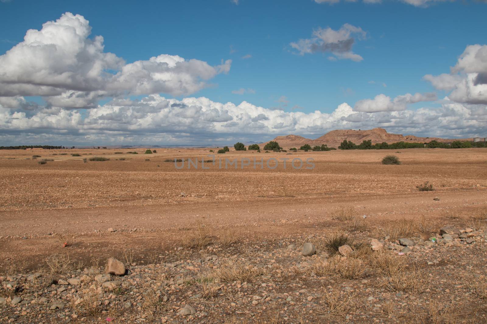 Moroccan nature in the autumn. Empty field ready for the new season. Intense cloudy sky.