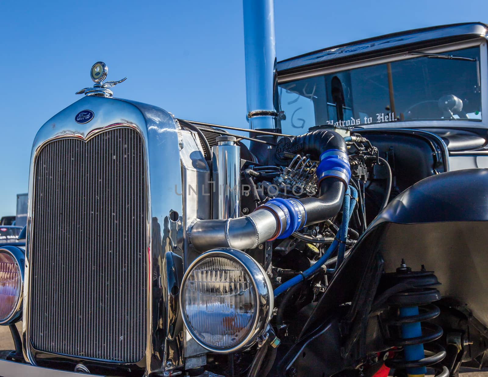 Redding, California, USA- February 13, 2016: A Ford hot rod's engine is on display for the crowd at the Redding Drags in northern California.
