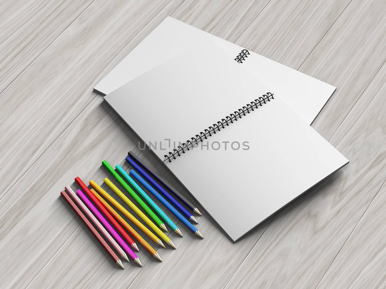 color pencil on checked notebook on wood background, stationary object