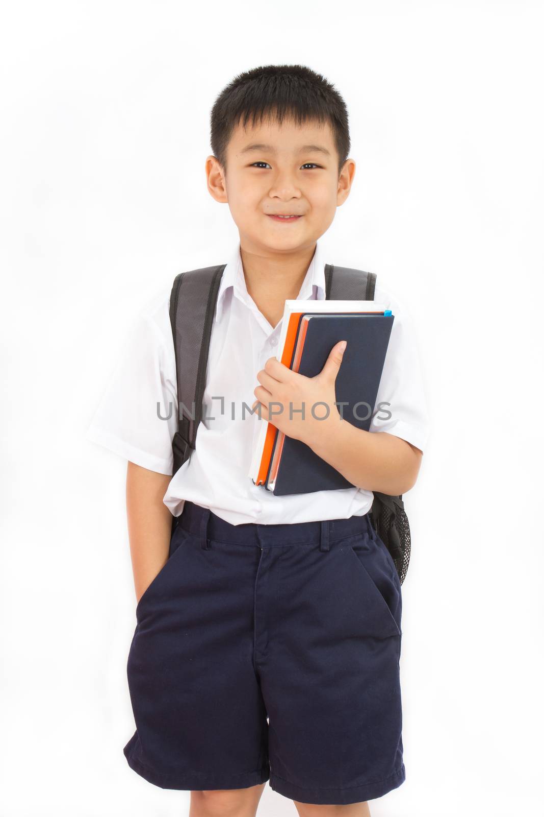 Asian Little School Boy Holding Books with Backpack on White Background