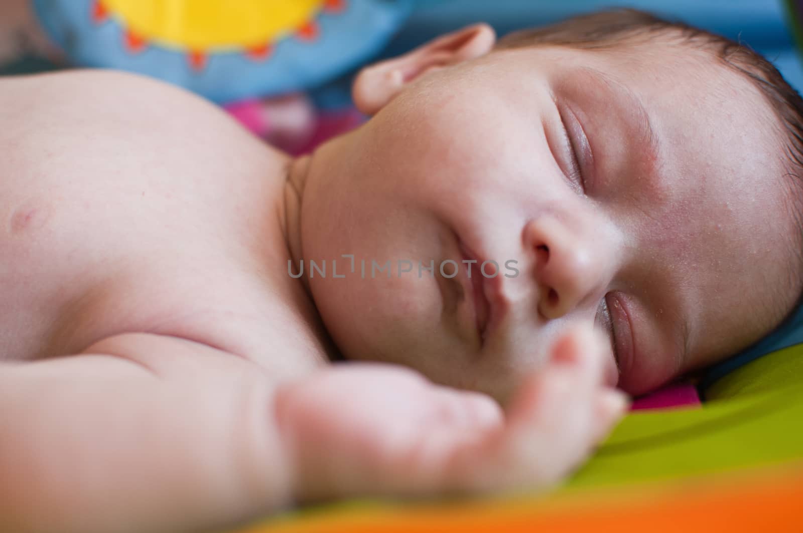 Closeup portrait of the sleeping little baby by Linaga
