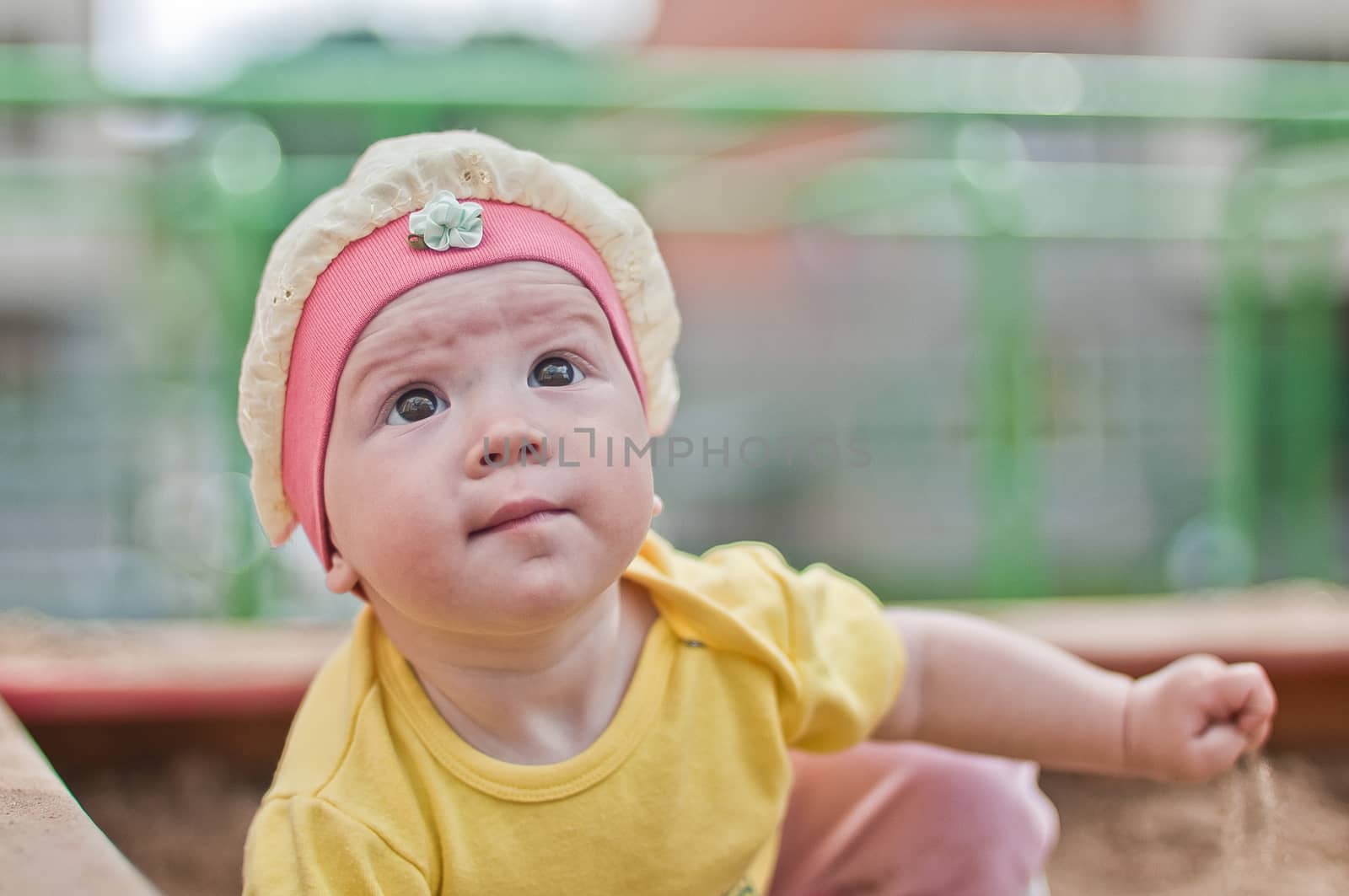 the Little smiling baby in hat horizontal  portrait