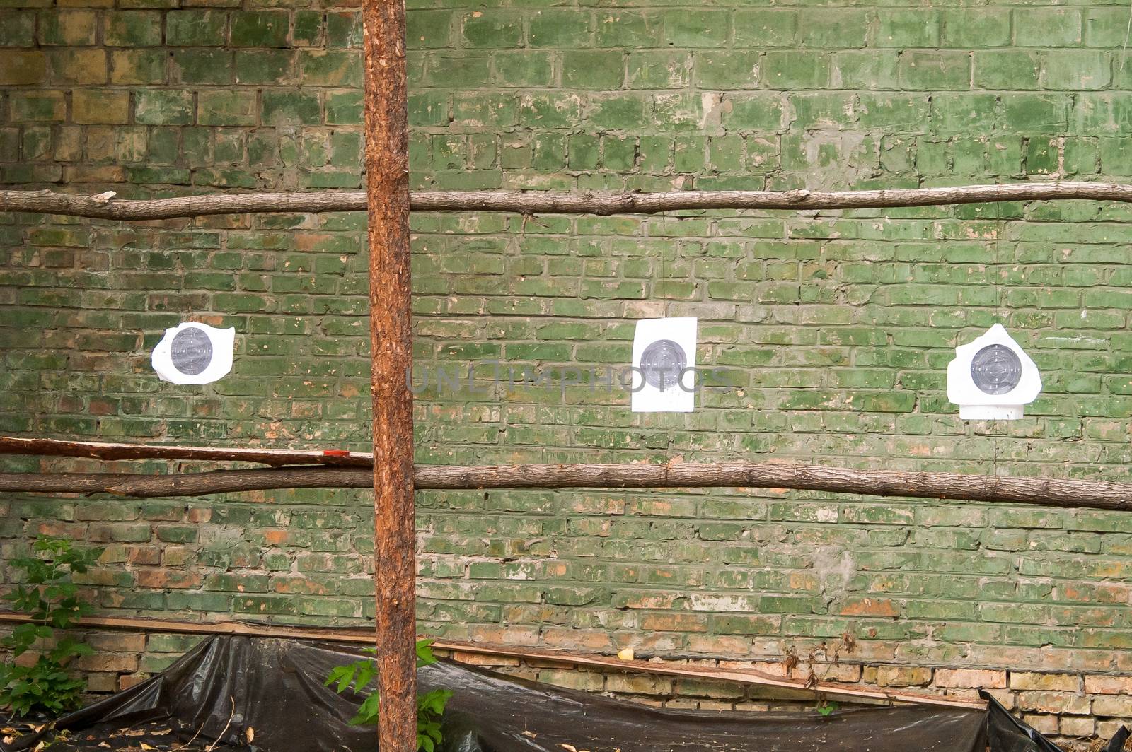 target on the brick wall street shooting range