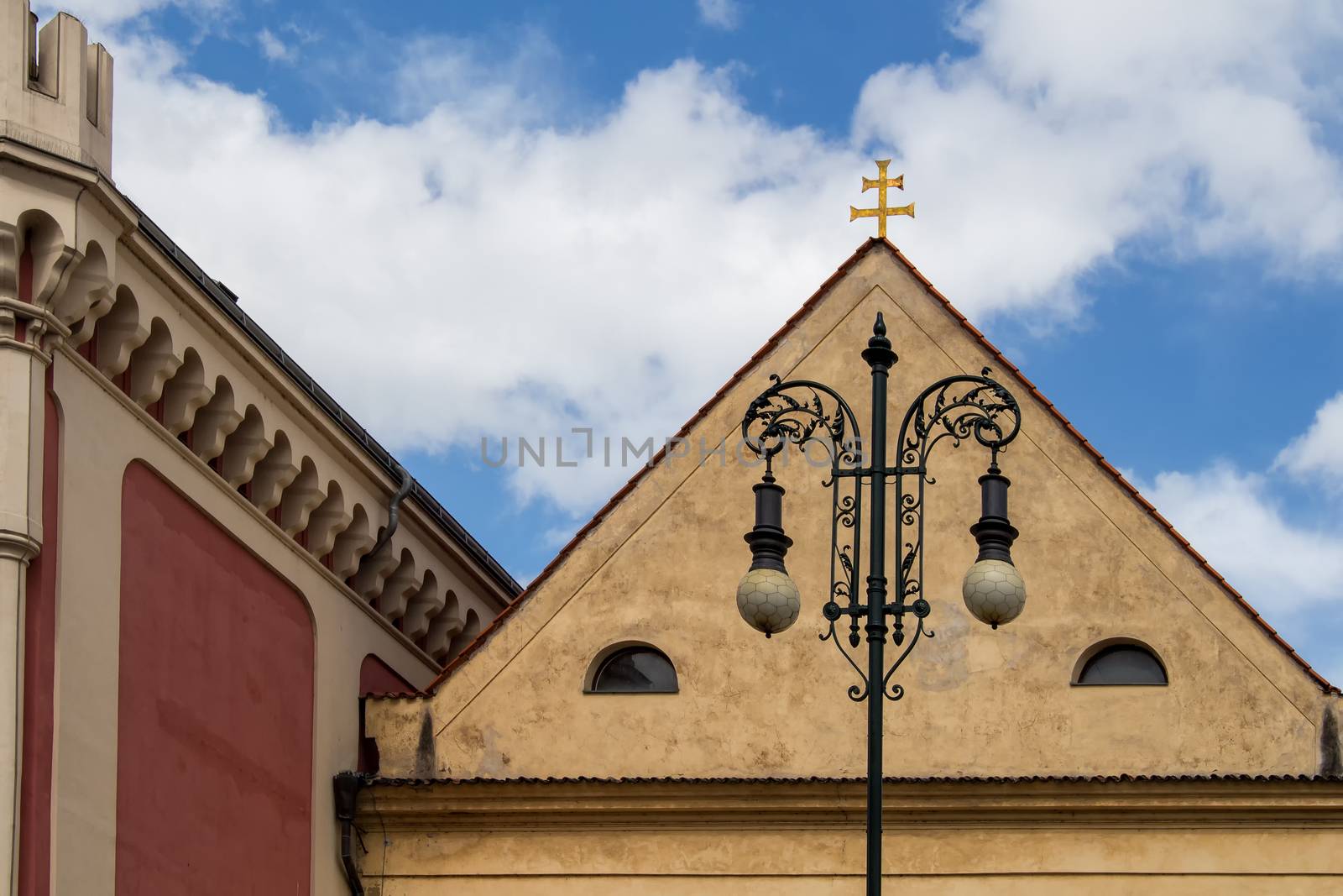 Traditional european architecture in the capital of Czech Republic, Prague. Cloudy sky.