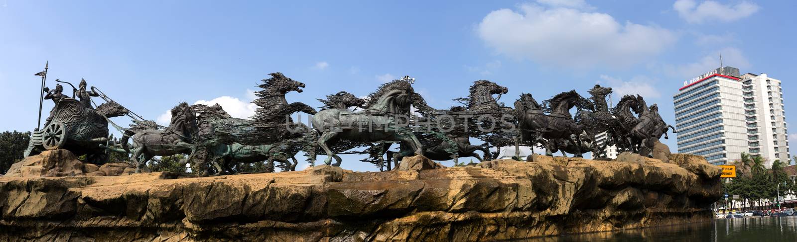 JAKARTA - August 10: Arjuna Wijaya chariot statue and fountain in Central Jakarta. August 10, 2015 in Jakarta, Indonesia.