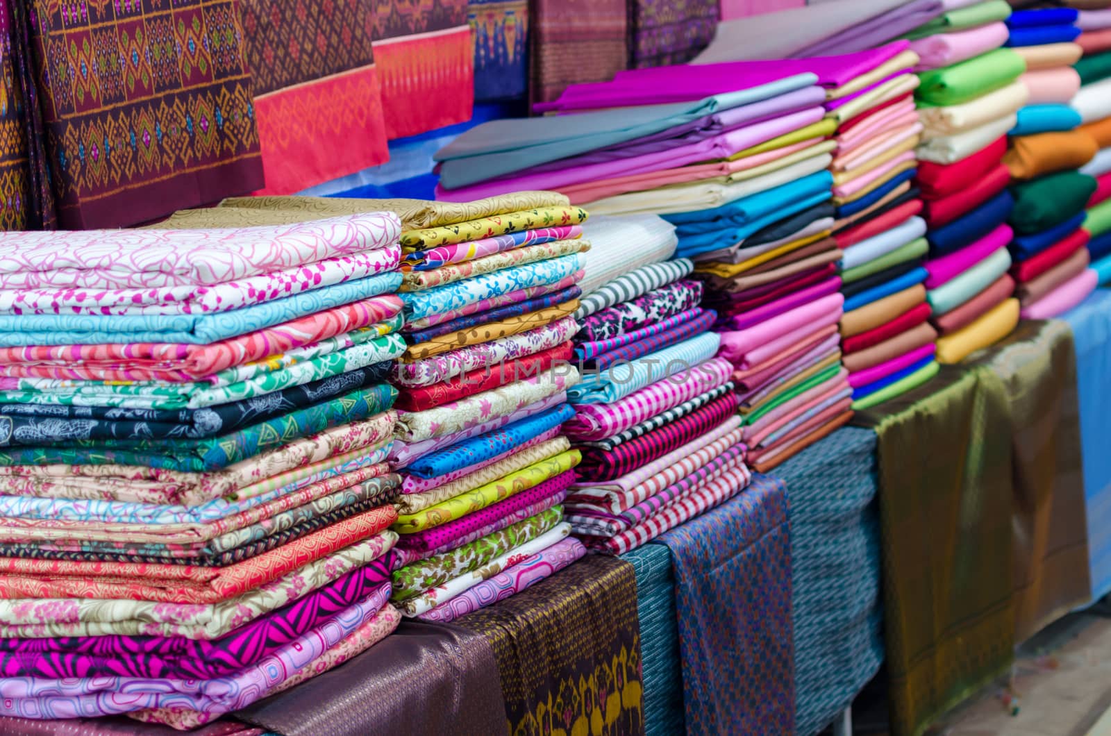 Pile of colorful  fabrics  Into the regulations.