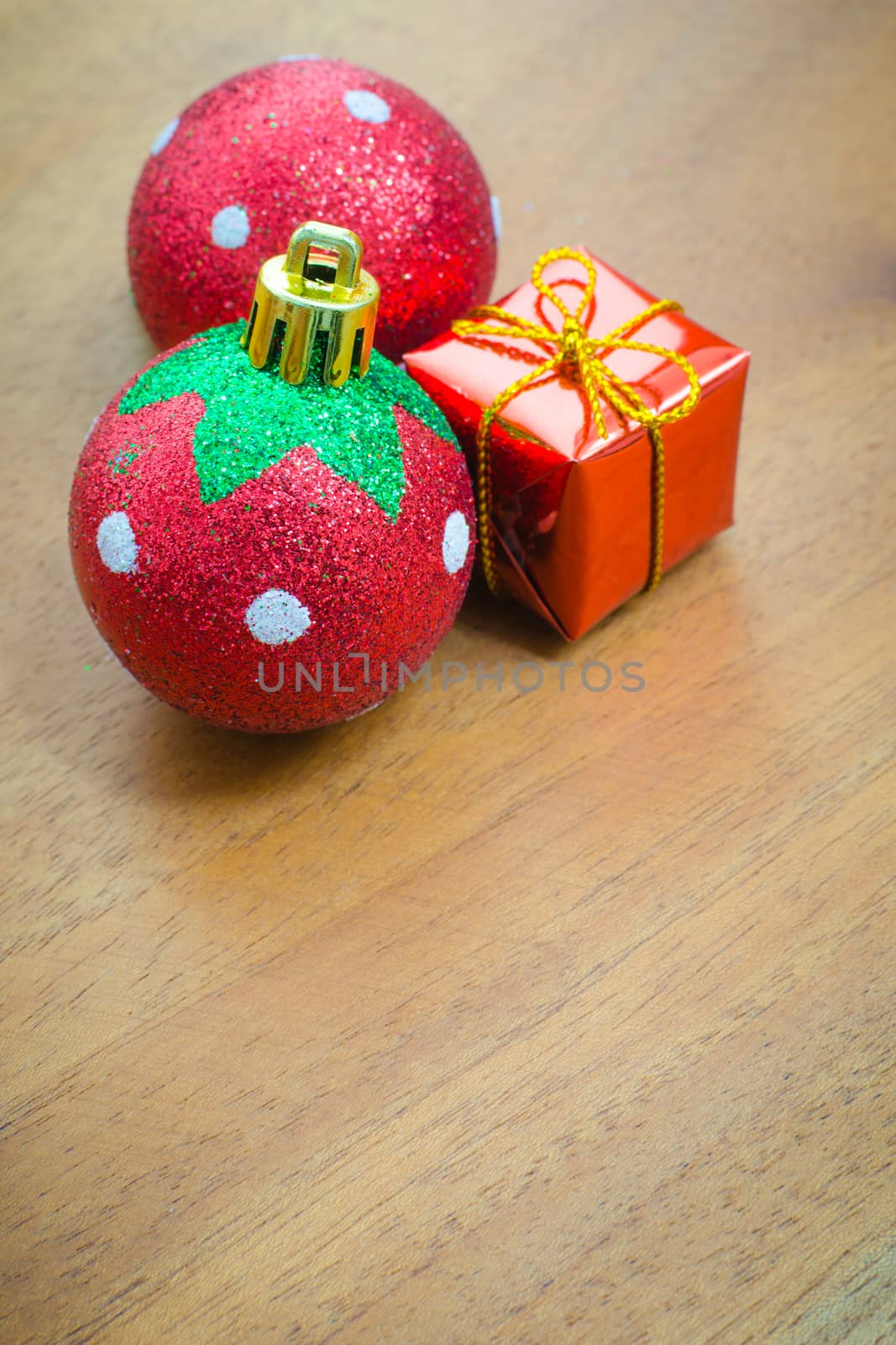 Christmas ball and Christmas decorations on wooden background