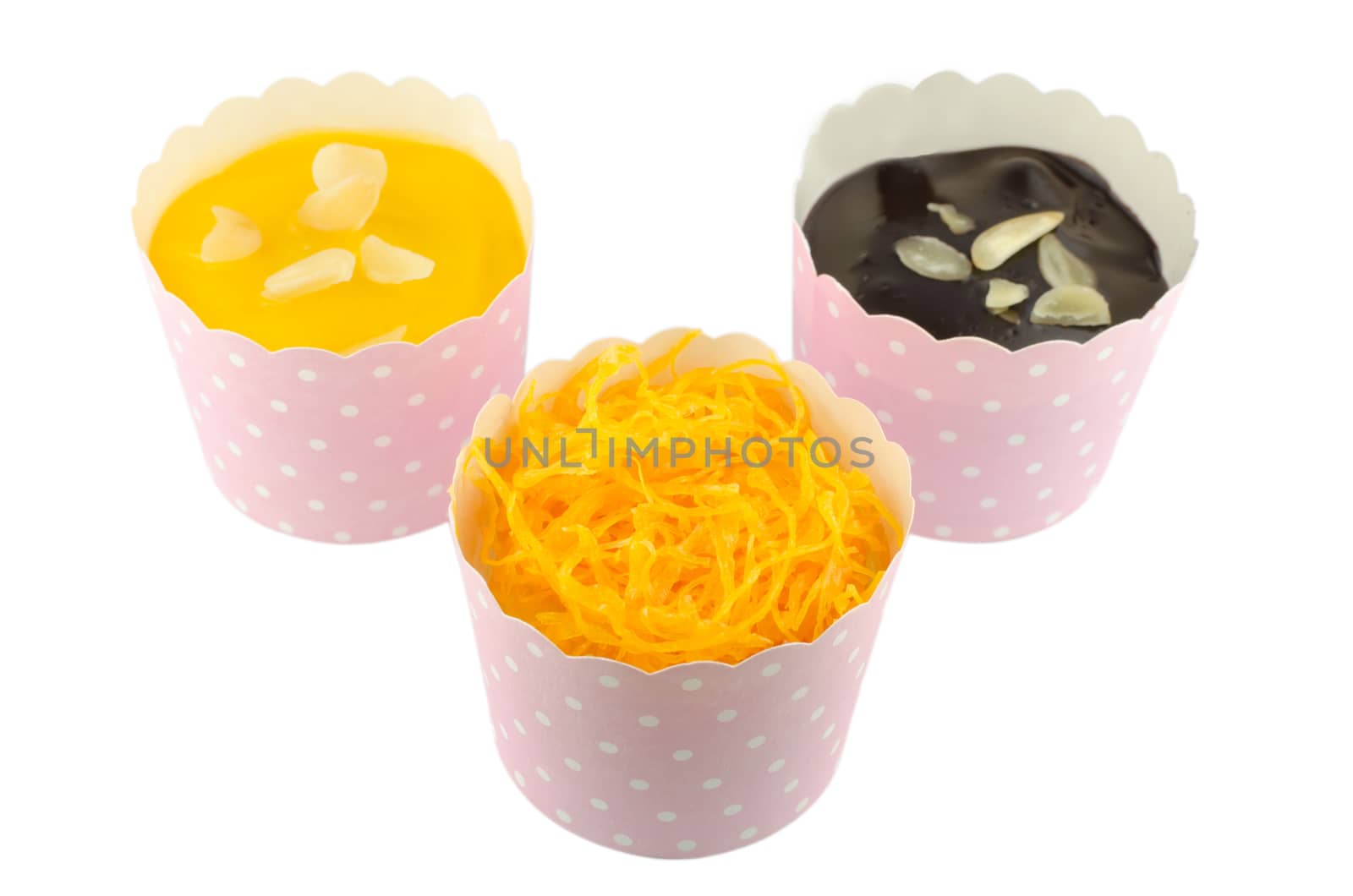 Cupcakes, flavor sweet egg,orange , chocolate isolated on white background.