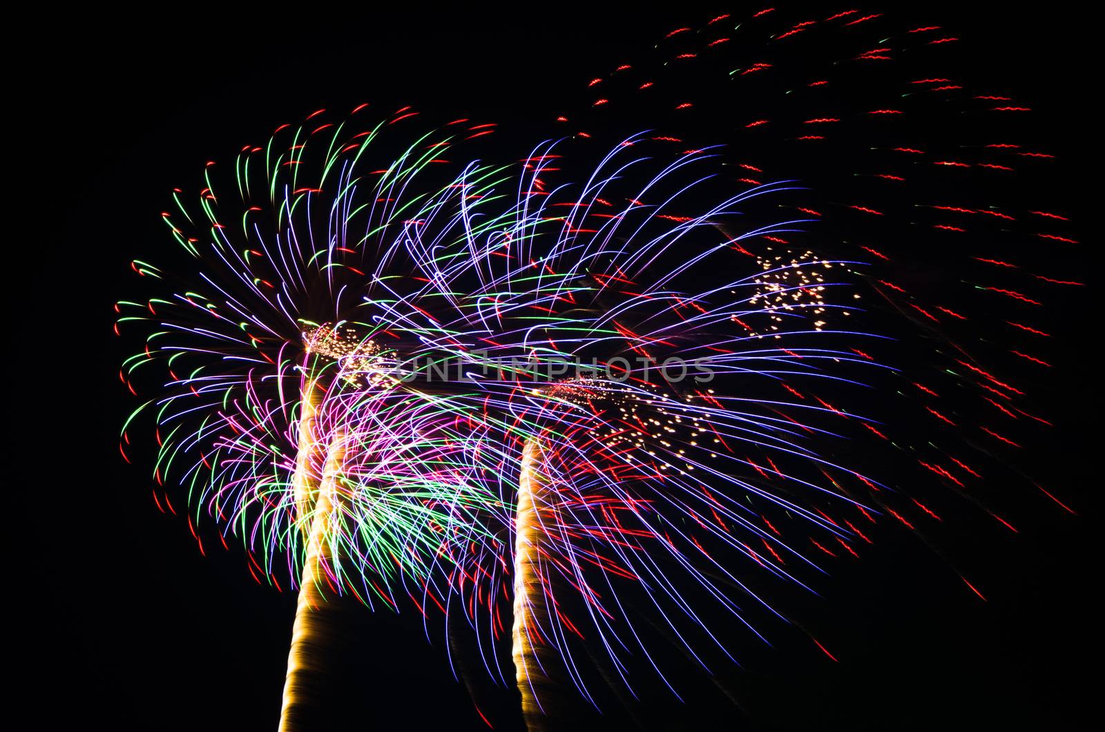 An image of exploding fireworks at night by nop16