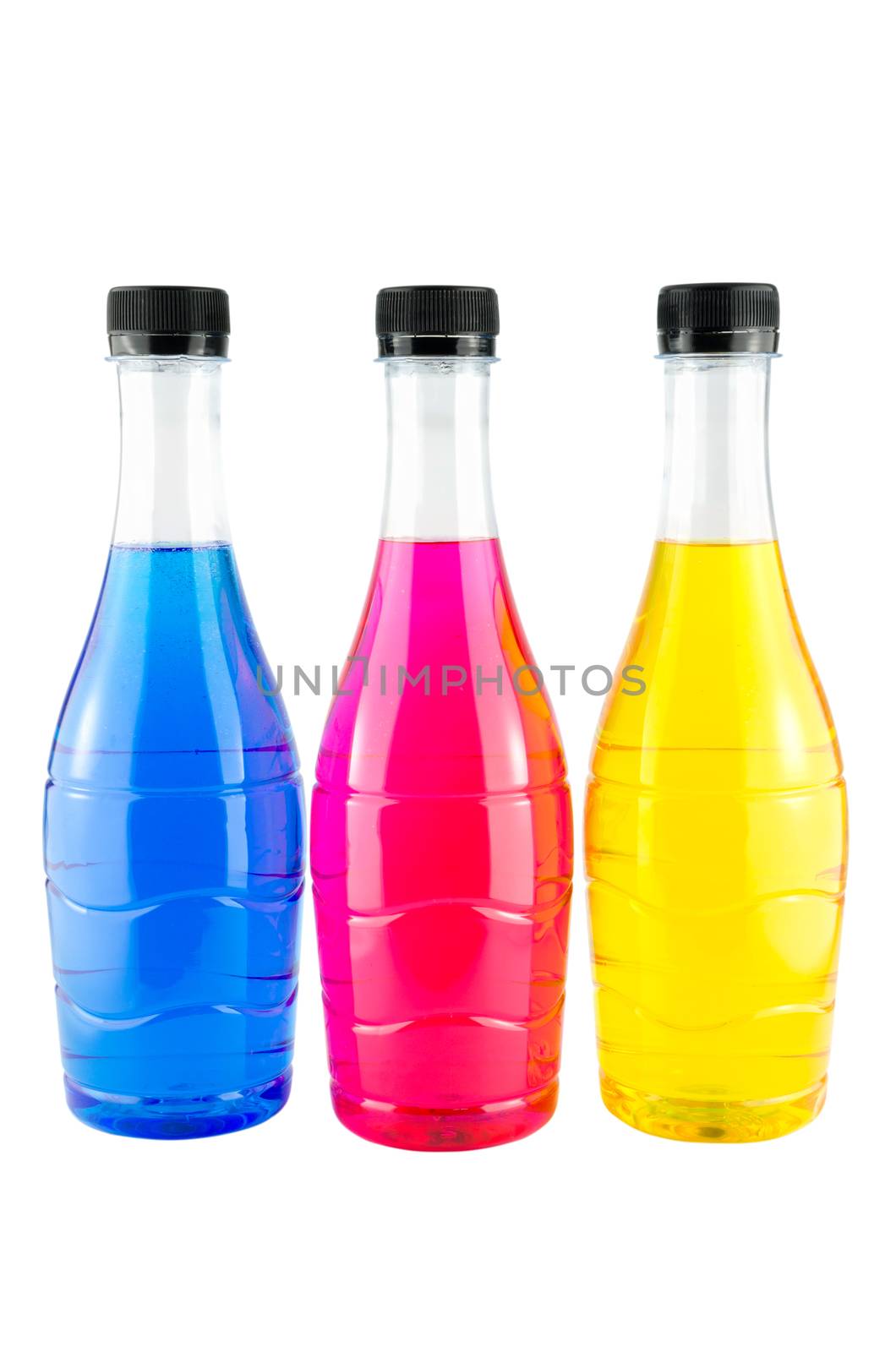 Bright colorful water in bottles on white background