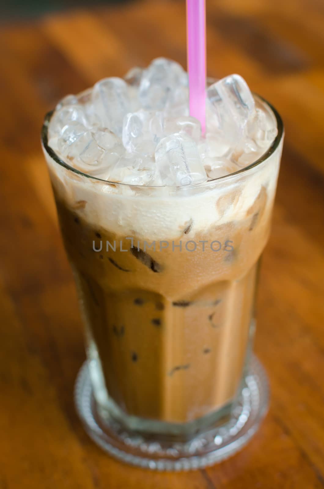 Traditional iced coffee on wood table by nop16