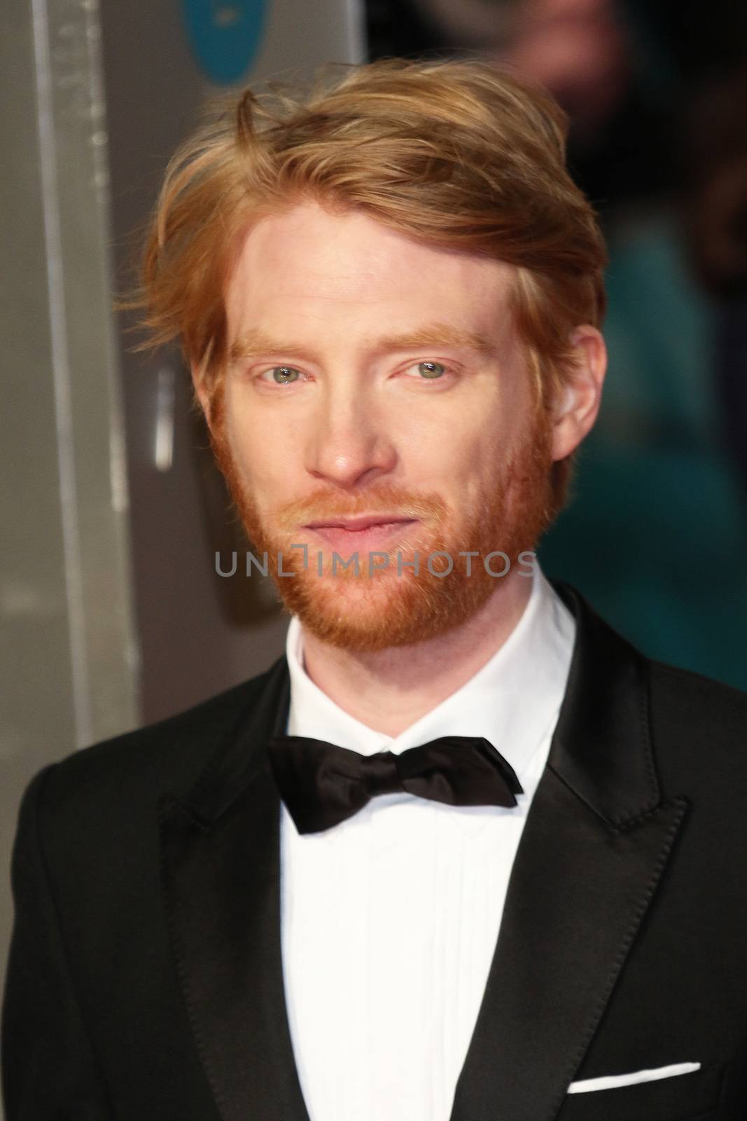 UK, London: Irish actor Domhnall Gleeson poses on the red Carpet at the EE British Academy Film Awards, BAFTA Awards, at the Royal Opera House in London, England, on 14 February 2016.