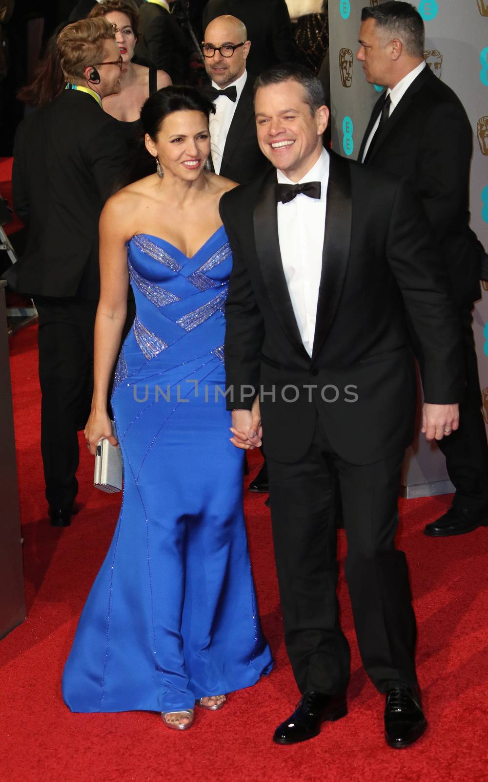UK, London: American actor Matt Damon poses with wife Luciana Barroso on the red Carpet at the EE British Academy Film Awards, BAFTA Awards, at the Royal Opera House in London, England, on 14 February 2016.