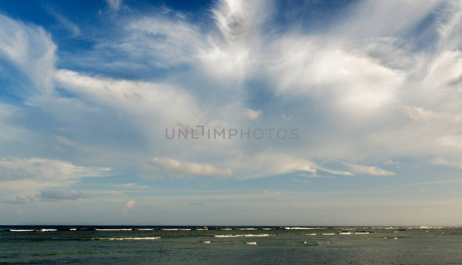 Beauty Fleecy Clouds on Summer Blue Sky under Indian Ocean Horizon Outdoors