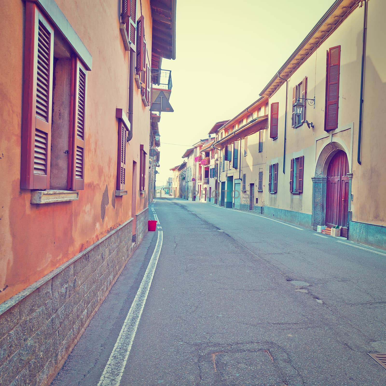 Narrow Street with Old Buildings in Italian City in Piedmont, Instagram Effect