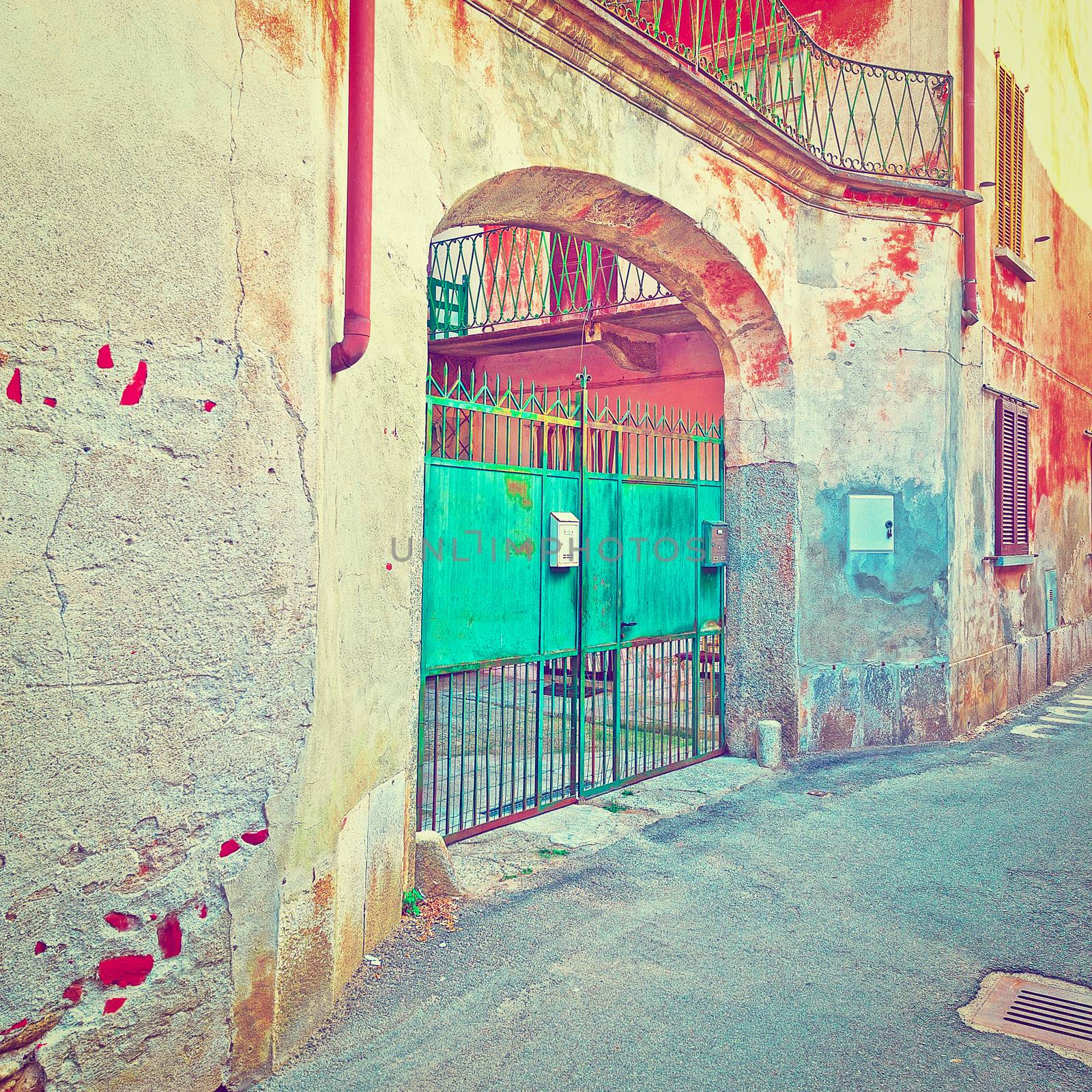 Facade of the Old Italian House with Balcony and Gate in Piedmont, Instagram Effect