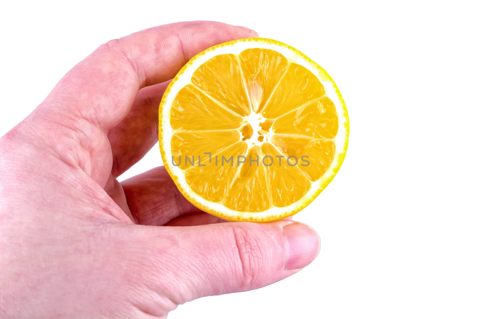 Hand with lemon isolated on a white background
