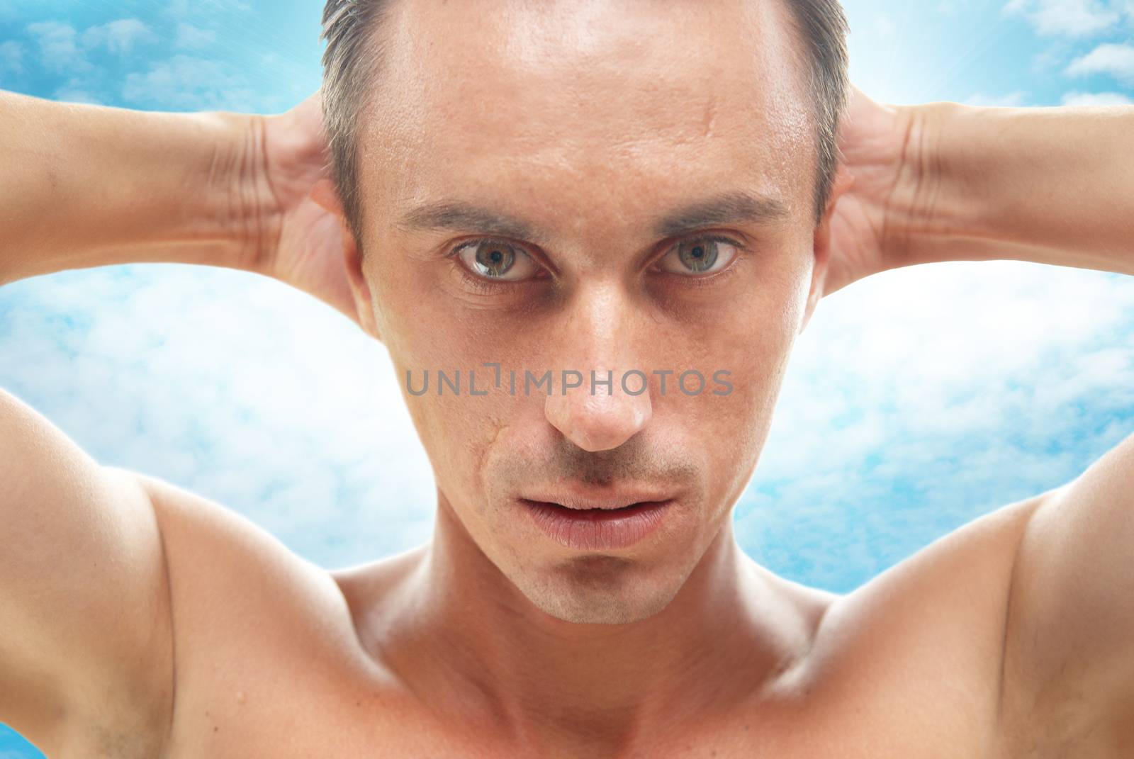 Portrait of muscular man isolated on white
