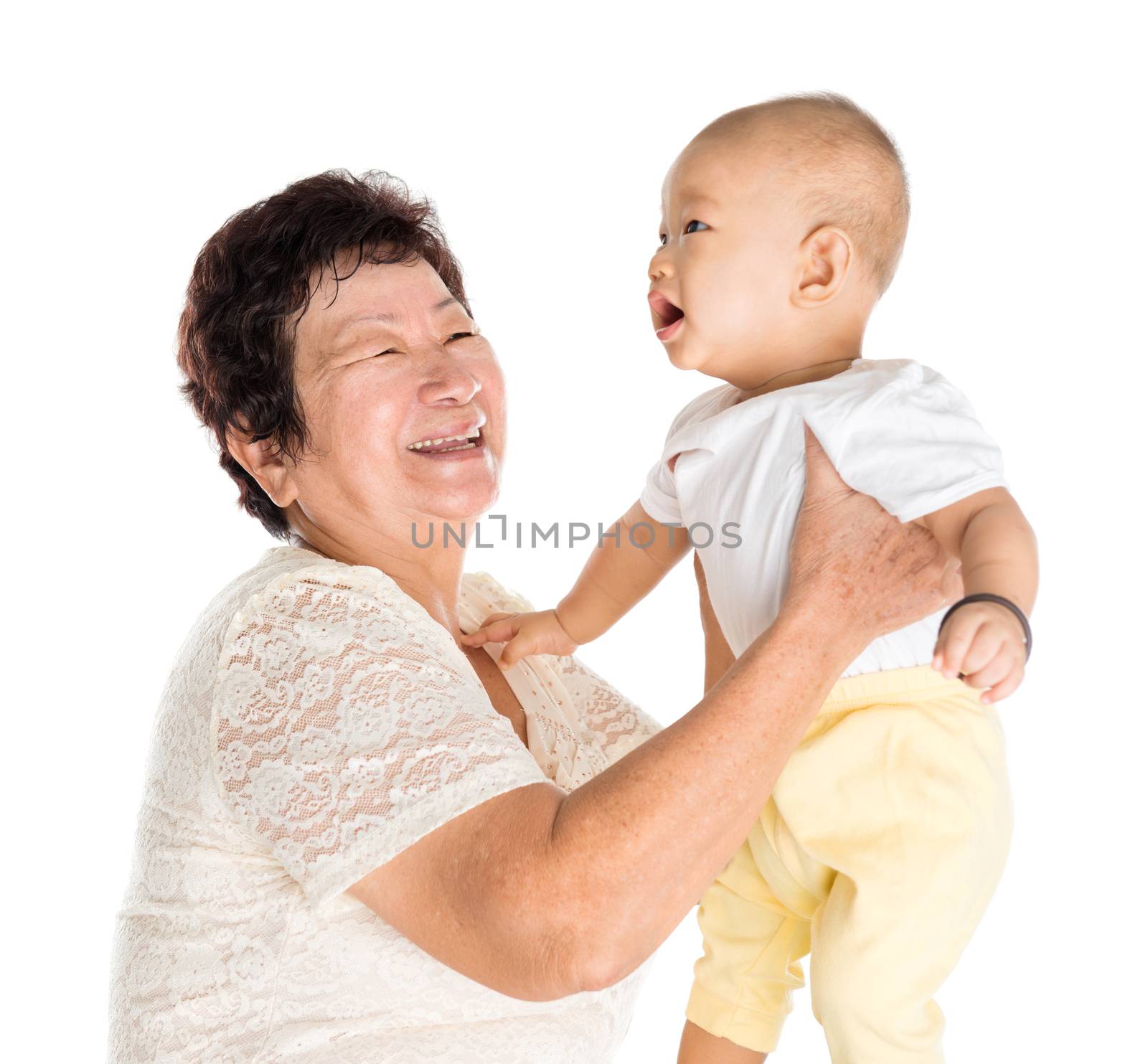 Asian grandmother and grandchild portrait, isolated on white background.