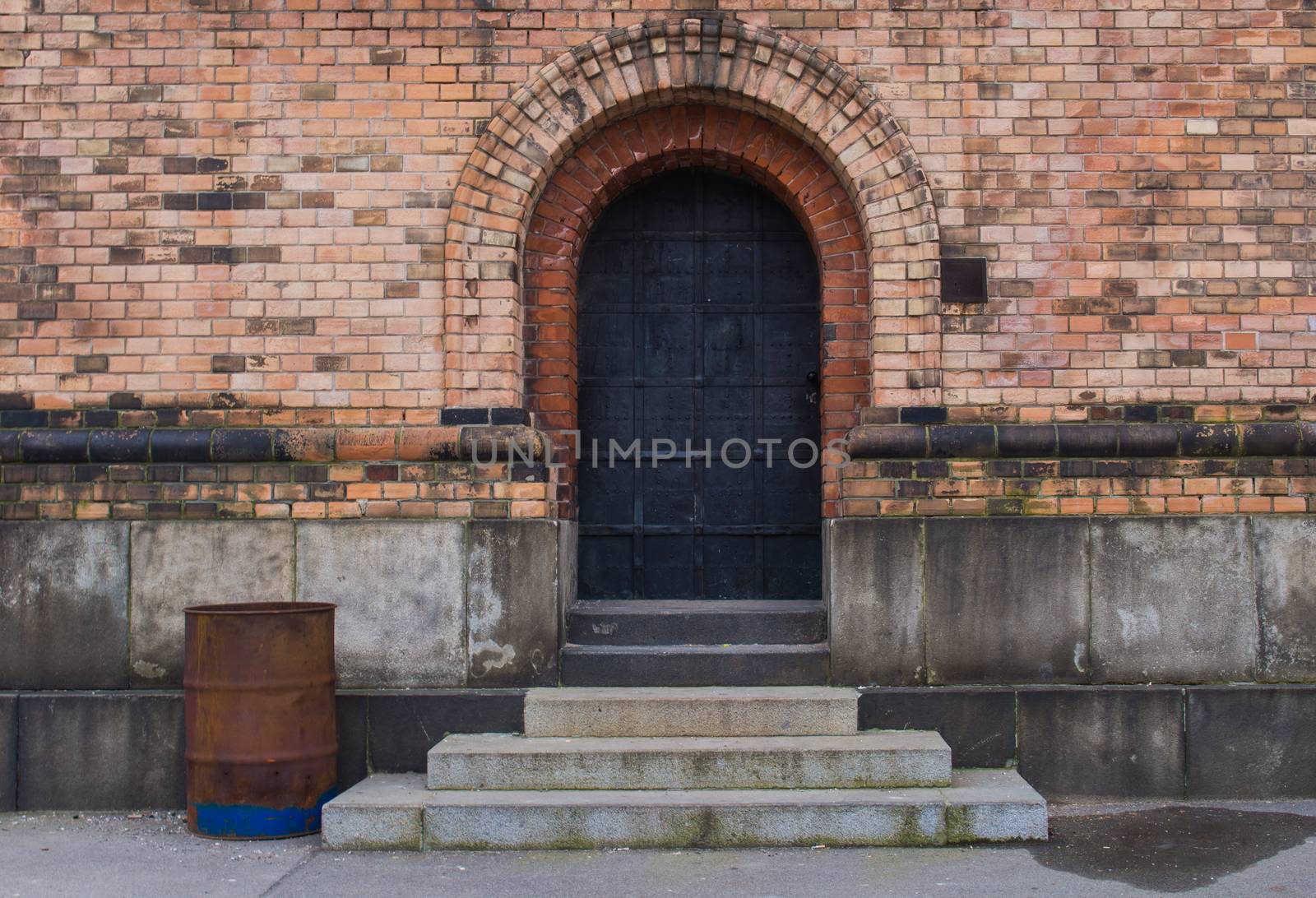 Saint Anton Church with its bricks facade. Entrance to the church.