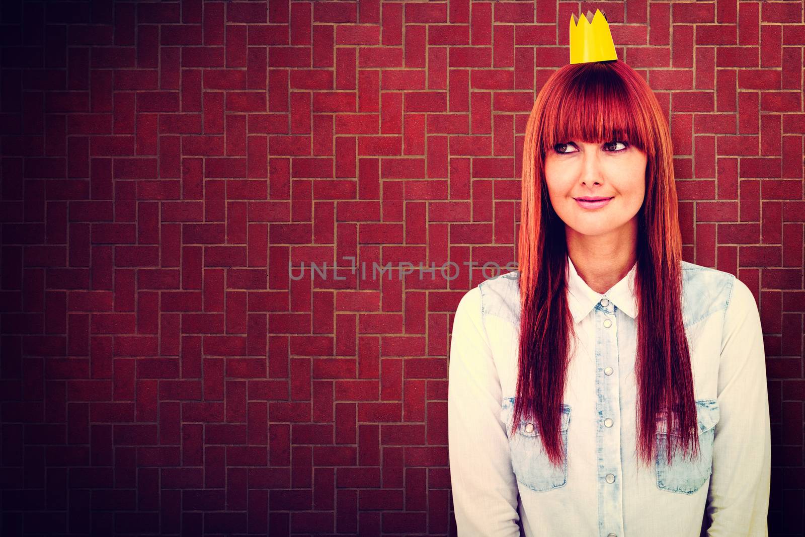 Happy hipster woman with a crowned against textured background