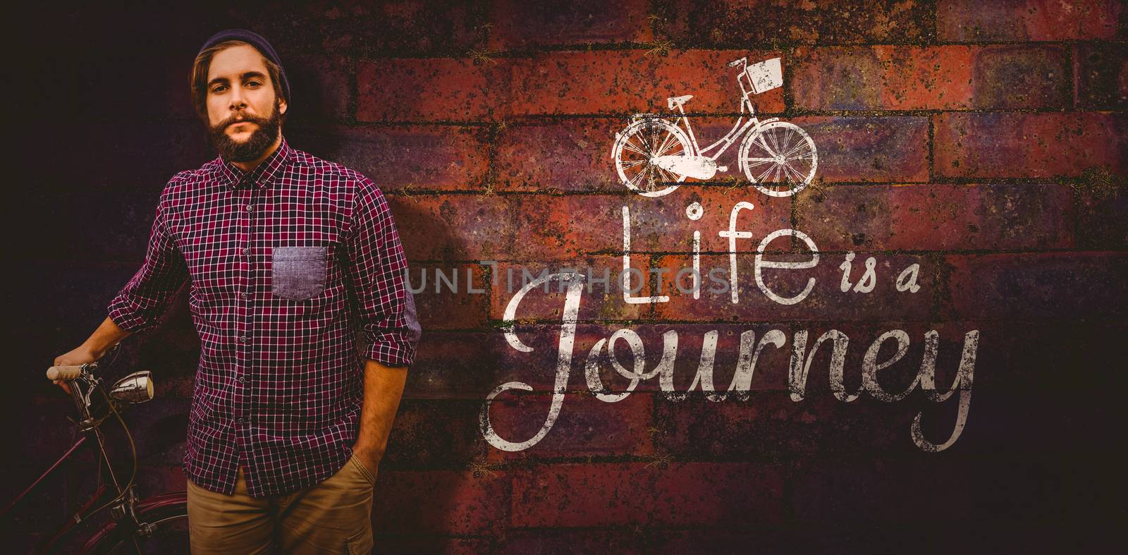 Composite image of portrait of confident hipster with bicycle by Wavebreakmedia
