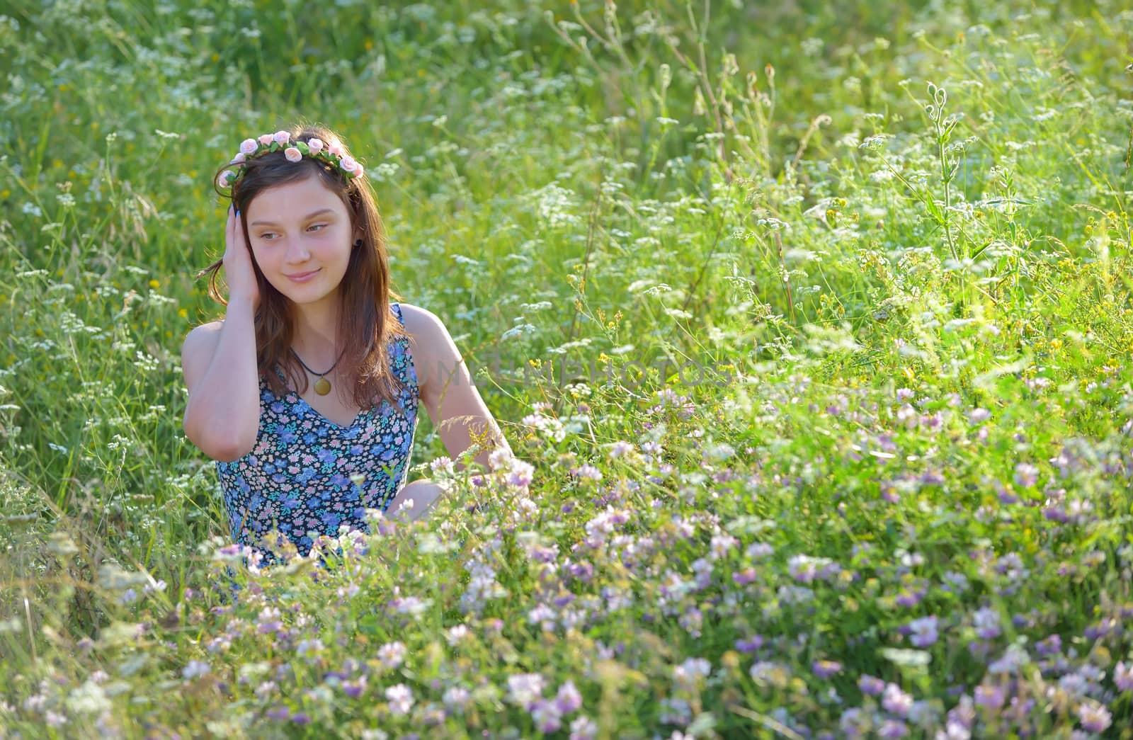 Beautiful teenage girl enjoying nature