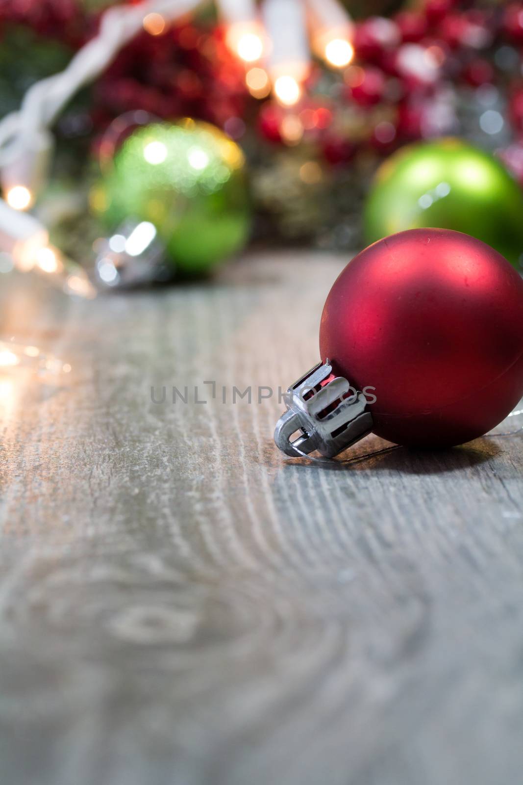 Christmas decorations and ornaments on a wooden background.