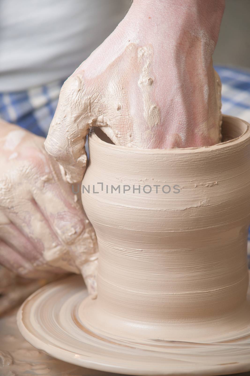 Hands of a potter by kozak
