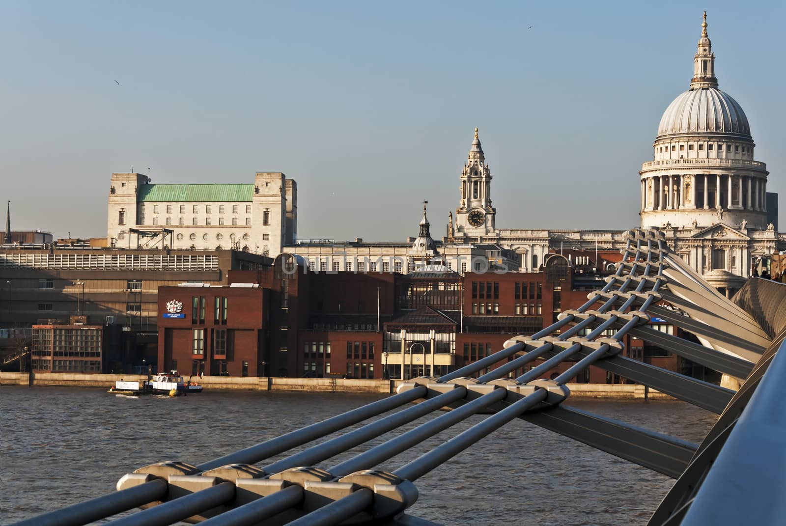 modern building on the Thames in London, UK