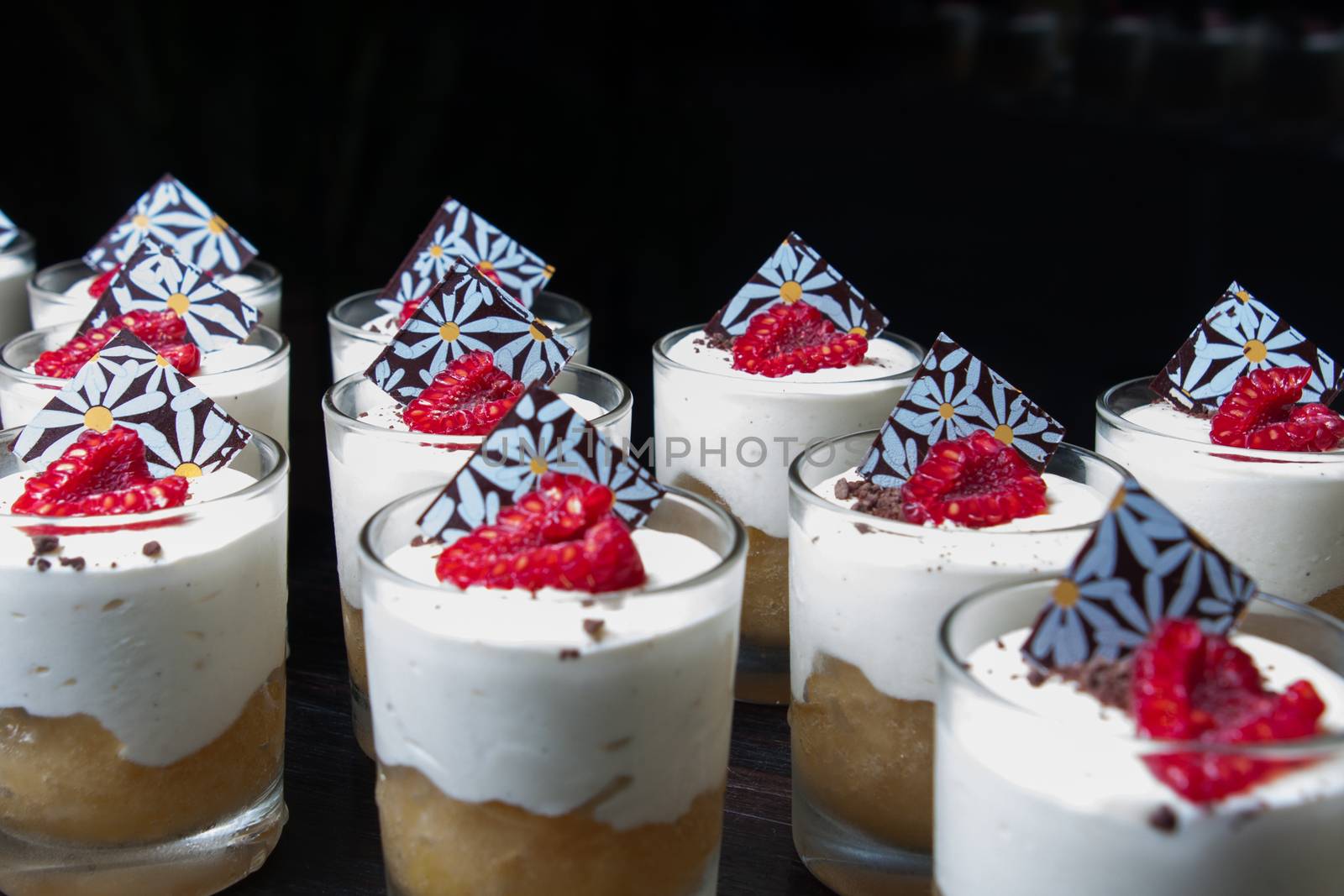 stack of desert sweet cakes with frozen yogurt  raspberry and chocolate
