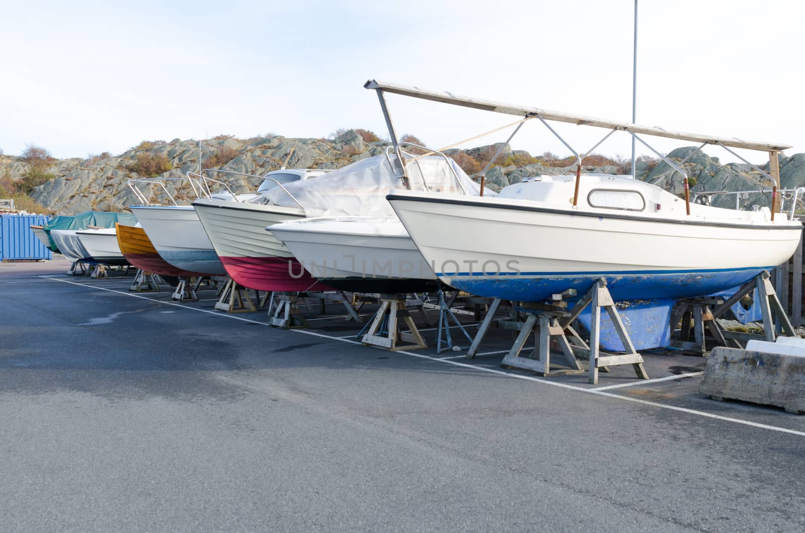 many boat on storage for the winter on the pier