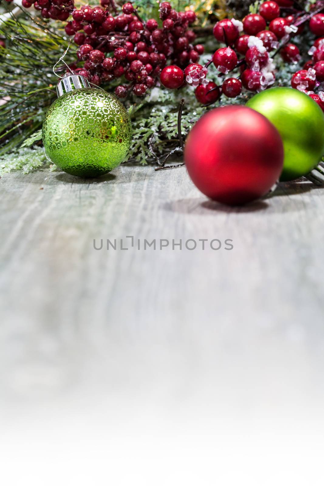 A wooden background with Christmas ornaments and decorations