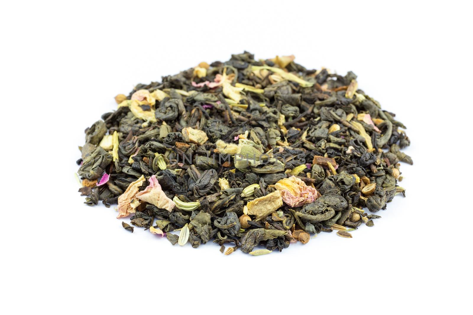 Heap of blend biological loose Flower Power tea isolated on white