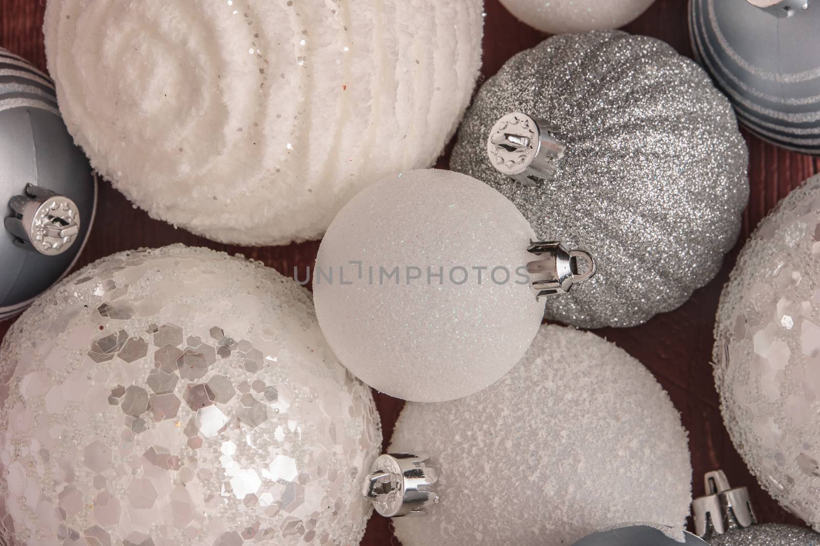 Festive glitter christmas balls decorations. Seasonal winter holidays. Top view with copy space