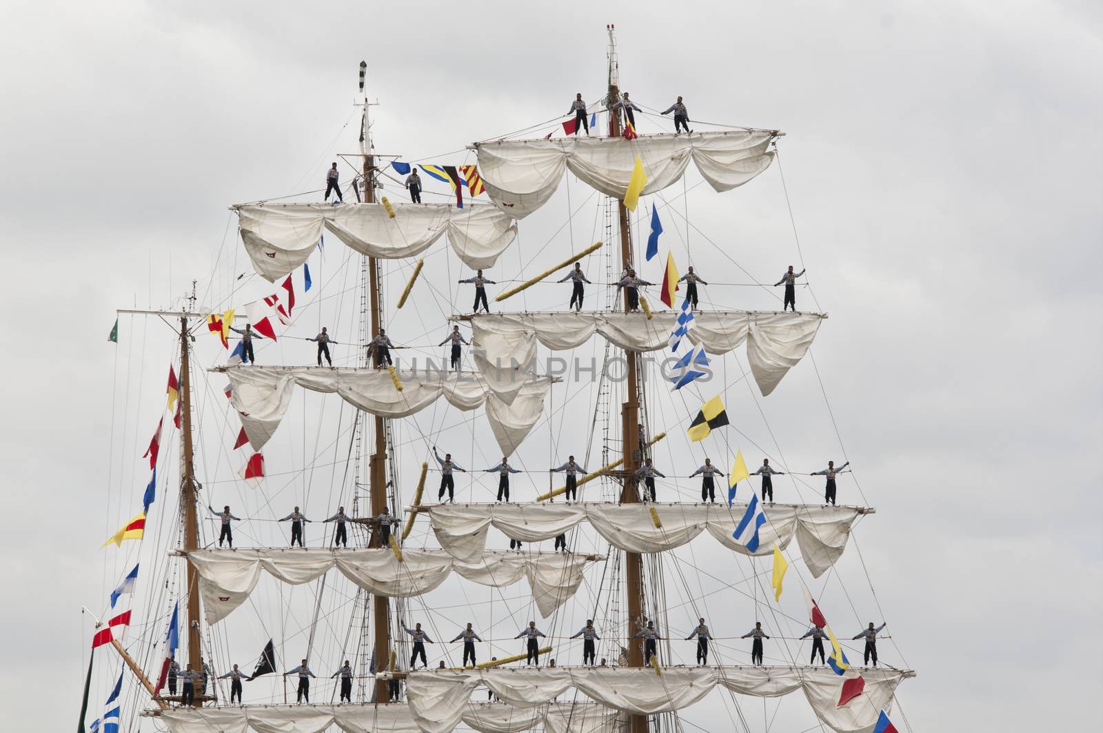 Men on the matt of big veil boat by CatherineL-Prod