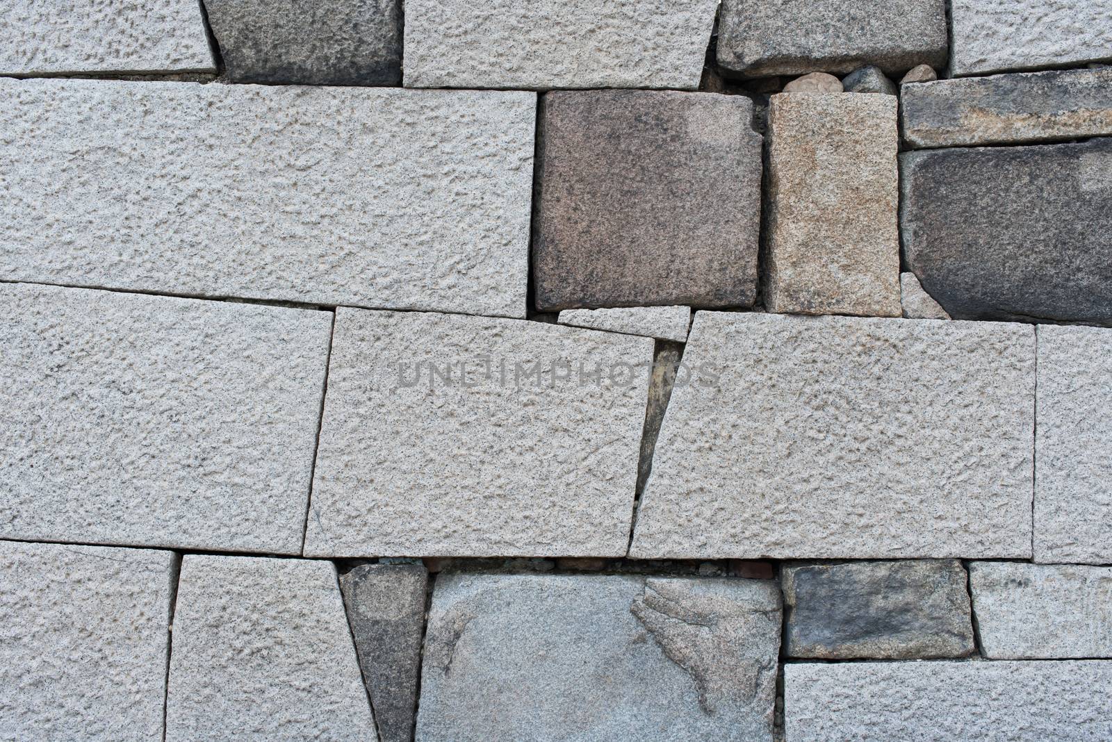 Old rock wall in pattern like jigsaw fashion by MCVSN