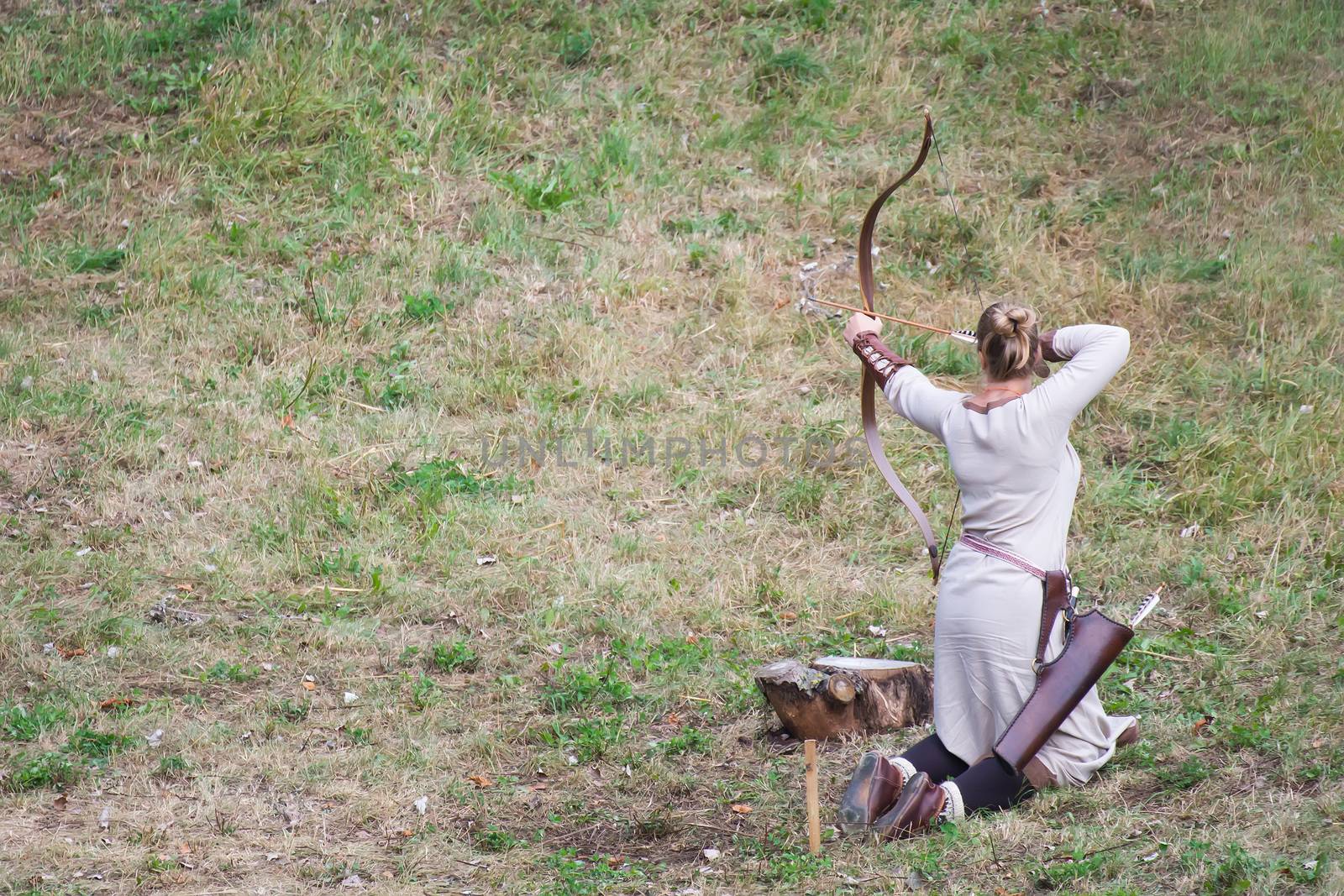 Slavic archer female aiming the target