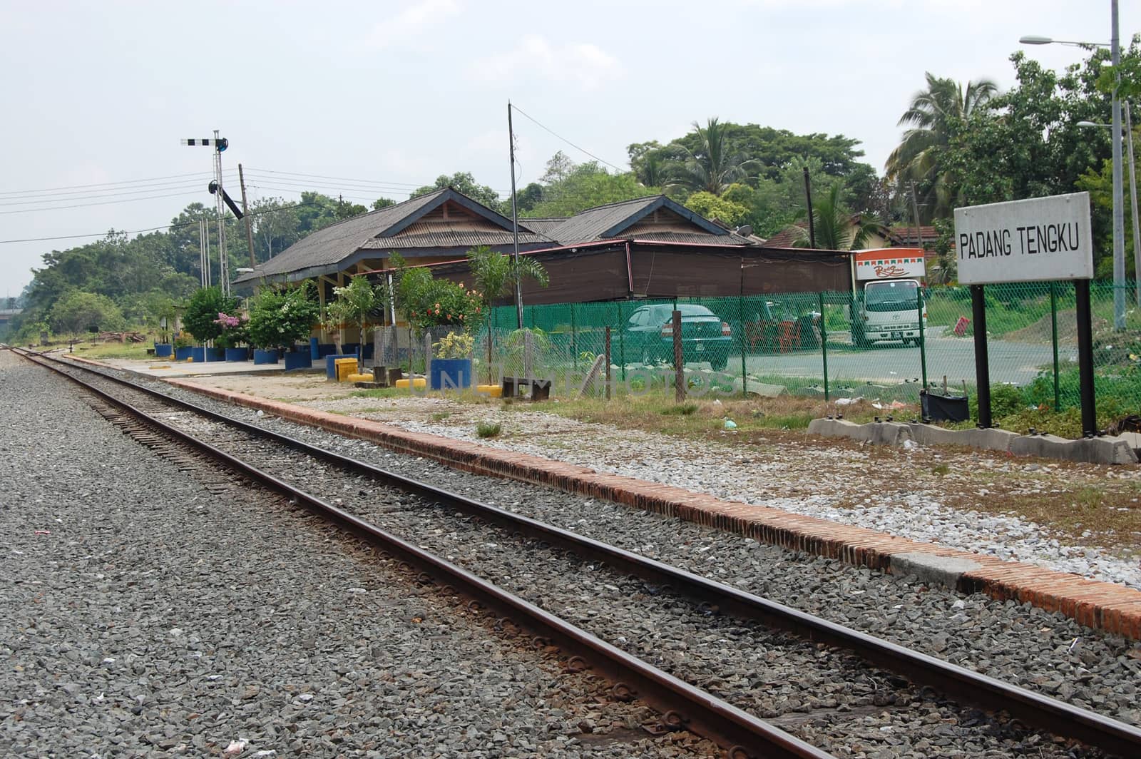 Railway platform at station in outback of Malaysia, Padang Tengku