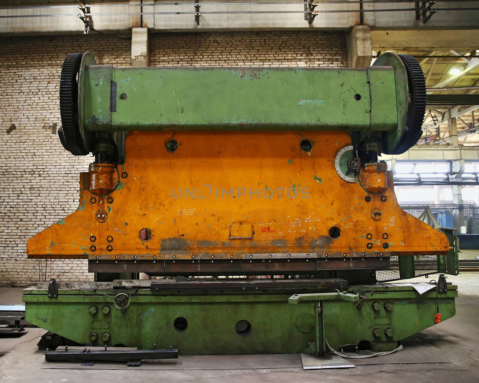 Old industrial press for bending steel sheets