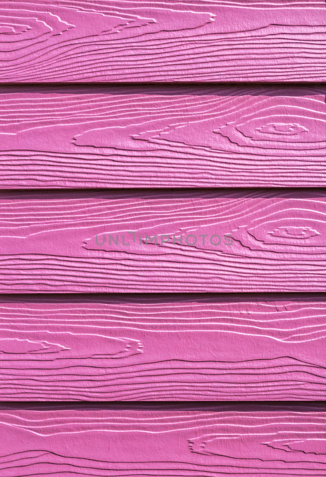 Closeup pattern and  texture of pink wooden background