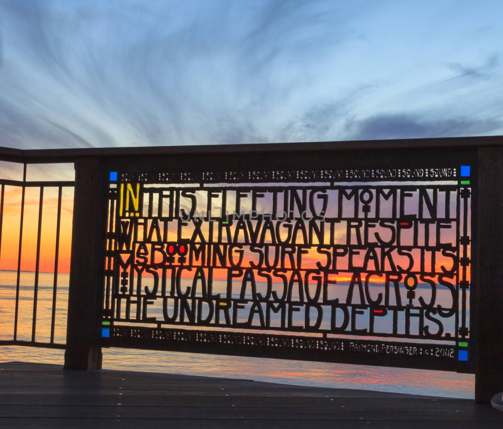 Stained glass fence at Browns Park in Laguna Beach, California at sunset.